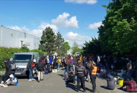 French police evict hundreds from abandoned Paris warehouse ahead of Olympics