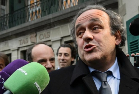 Michel Platini arrives at FIFA for 8-year ban appeal