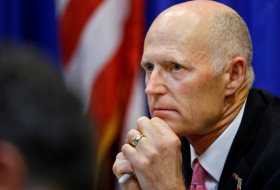 Florida governor proposes new gun sale limits after school shooting  