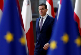 Poland wins temporary EU reprieve in fight over rule of law
 