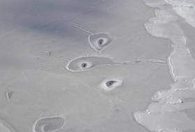 These mysterious Arctic ice holes have NASA scientists puzzled