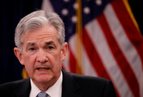 Fed's Powell points to rate hikes, uncertainty on trade tensions
 