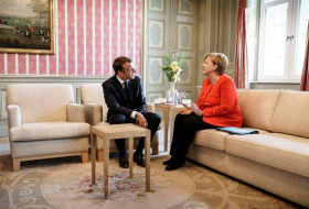 Merkel, Macron back euro zone budget in 'new chapter' for bloc  