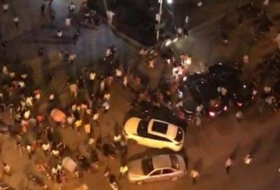 Eleven killed in China as car plows into square, driver attacks people
 