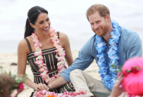 Britain's royal couple join mental health group hug on Australia's Bondi Beach  