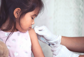 Flu vaccine appears to reduce risk of severe COVID-19 symptoms in kids  