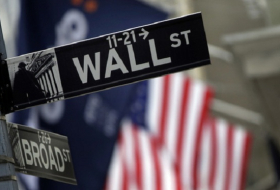 Wall Street gains, bank sector surges to 2008 high