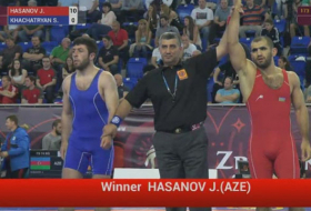 Azerbaijani athelete defeats Armenian wrestler, wins license for Rio 2016 - VIDEO