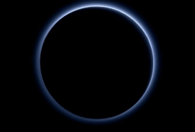 Pluto`s glowing halo shines in new NASA image