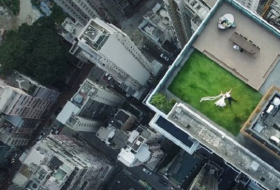 Rooftop `newlyweds` captured by accidental drone shot
