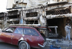 Syria crisis: Rebels `leave Homs` under truce