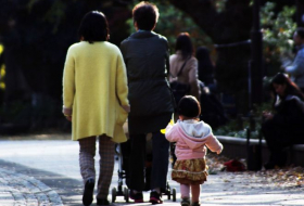 Japan court upholds law on married couples` surnames