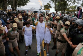 Protest mars Olympic torch Rio arrival ahead of ceremony