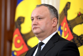 Moldova government expels five Russian diplomats, president furious