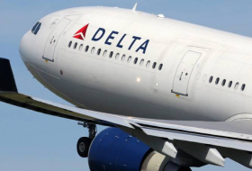 Delta airlines pilot appears to slap woman in fight at Atlanta Airport- VIDEO
