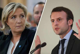 Le Pen loses ground to Macron in French election race - poll