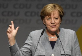 Merkel: State defeat has not weakened conservatives before coalition talks