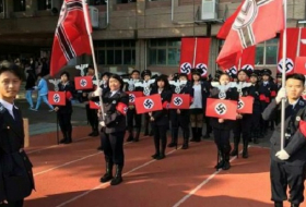 Principal of Taiwan school resigns over Nazi-themed parade 