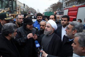 Rouhani visits Tehran’s collapsed Plasco building  