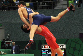 Two Azerbaijani wrestlers reach finals at Baku 2015