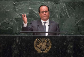French President pledges to work with all parties towards political solution in Syria