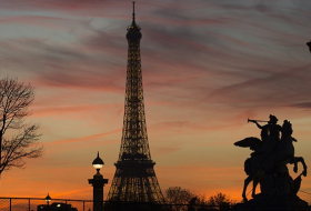 Paris` iconic Eiffel Tower on lockdown as armed police search crowds