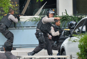 Indonesian police arrest 6 militants planning attacks in Singapore