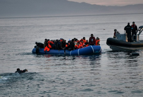 Greek coast guard rescues about 70 migrants after boat runs aground