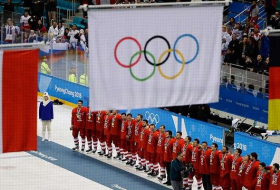 Russians win hockey gold as IOC keeps flag ban in place