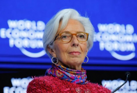 IMF's Lagarde says market swings aren't worrying, but wants reforms  