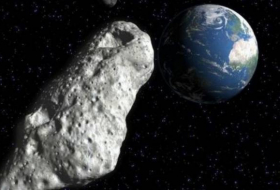Asteroid skimming past Earth may loom larger than exploding Russian meteor 