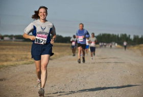 A smile will improve your run, research finds