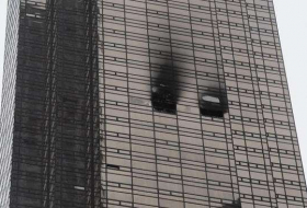 Fire at Trump Tower leaves man dead and 6 firefighters injured