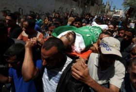 Israeli forces kill two Palestinians near border as Gaza buries dead
