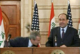 Iraqi journalist who threw shoes at Bush stands for parliament
 