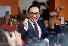 Jailed Malaysian leader Anwar Ibrahim walks free after royal pardon
 