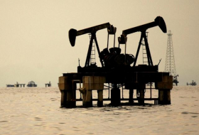Oil prices mixed but expected output increase drags  