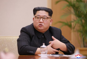 Kim Jong Un impersonator says detained for hours at Singapore airport
 