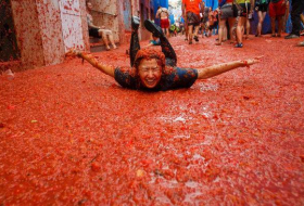 La Tomatina Festival: Why do Spanish throw tomatoes at each other?