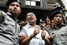 Myanmar jails Reuters journalists for 7 years in 'state secrets' case