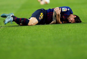 Messi to miss Clasico with fractured arm