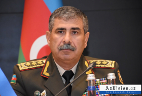   Azerbaijani defense minister watches military parade in Minsk  