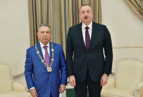  President Ilham Aliyev receives Ramiz Mehdiyev and presents “Heydar Aliyev” Order to him