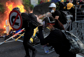   Hong Kong police break up protesters with force-  NO COMMENT    