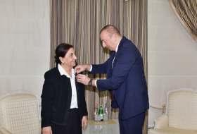  President Ilham Aliyev presents “Sharaf” Order to Dilara Seyidzade 