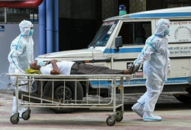 COVID-19 cases and deaths down globally in past week: WHO