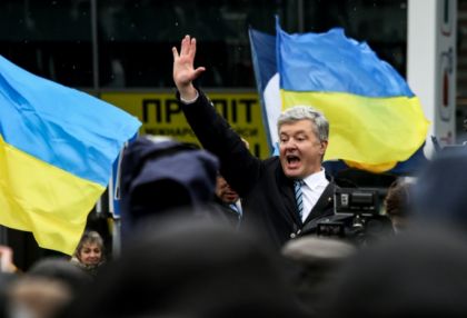   Facing arrest, ex-leader Poroshenko returns to 'defend Ukraine' from Russia -   NO COMMENT    