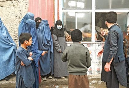   Desperate Afghans queue for free bread -   NO COMMENT    