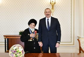  President Aliyev presents Istiglal Order to Fatma Sattarova  