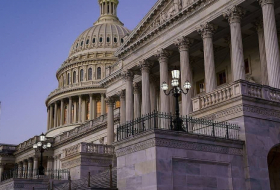 US Congress approves $430 billion package of initiatives to reduce inflation
 